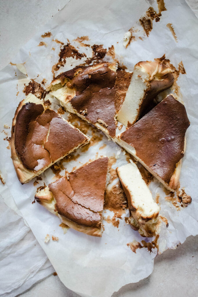 Gluten Free Burnt Basque Cheesecake on parchment paper