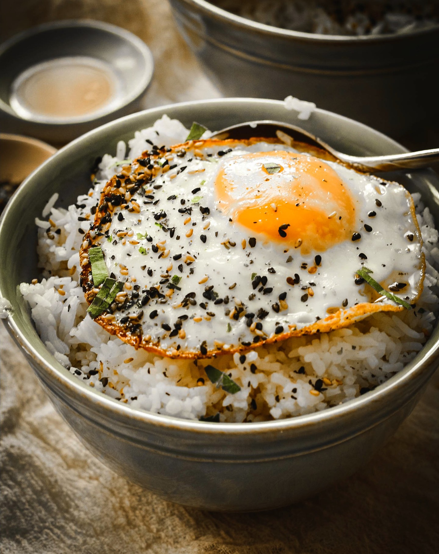 Tomago Kake Gohan is a quick easy breakfast that really can be made to please anyone. This fried egg with rice is the perfect balance of flavors, textures, and you can add on whatever veggies you like to make it an even more healthful dish.
Link to this recipe is in my bio and my stories! 
.
.
.
.
.
.
.
.
.
.
.
.
.
#siftrva #eggs #rice #glutenfreecooking #thebiteshot #citrusseason #f52community #storyofmytable #bombesquad #kitchn #f52grams #thebakefeed #bakefromscratch #makemore #beautifulfood #foodphotography #foodforfoodies #shareyourtable #wherewomencreate #foodphotographyandstyling #theartofslowliving #eatrealfood #heresmyfood #imsomartha #pursueyourpassion #mywilliamssonoma #foodfluffer #foodtographyschool #glutenfree

@thebakefeed @thekitchn @foodtographyschool @surlatable