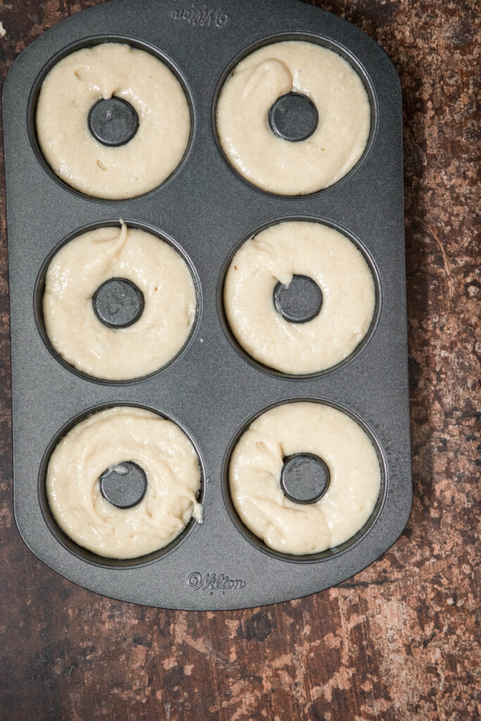donut pan with dough