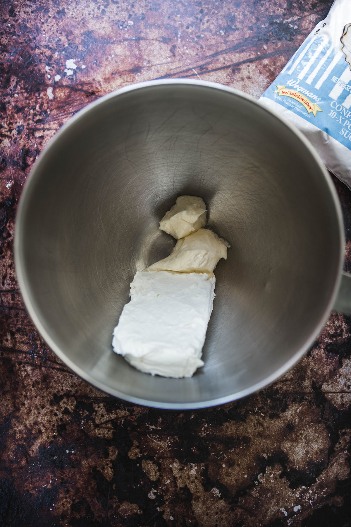 butter and cheese cream in a mixing bowl