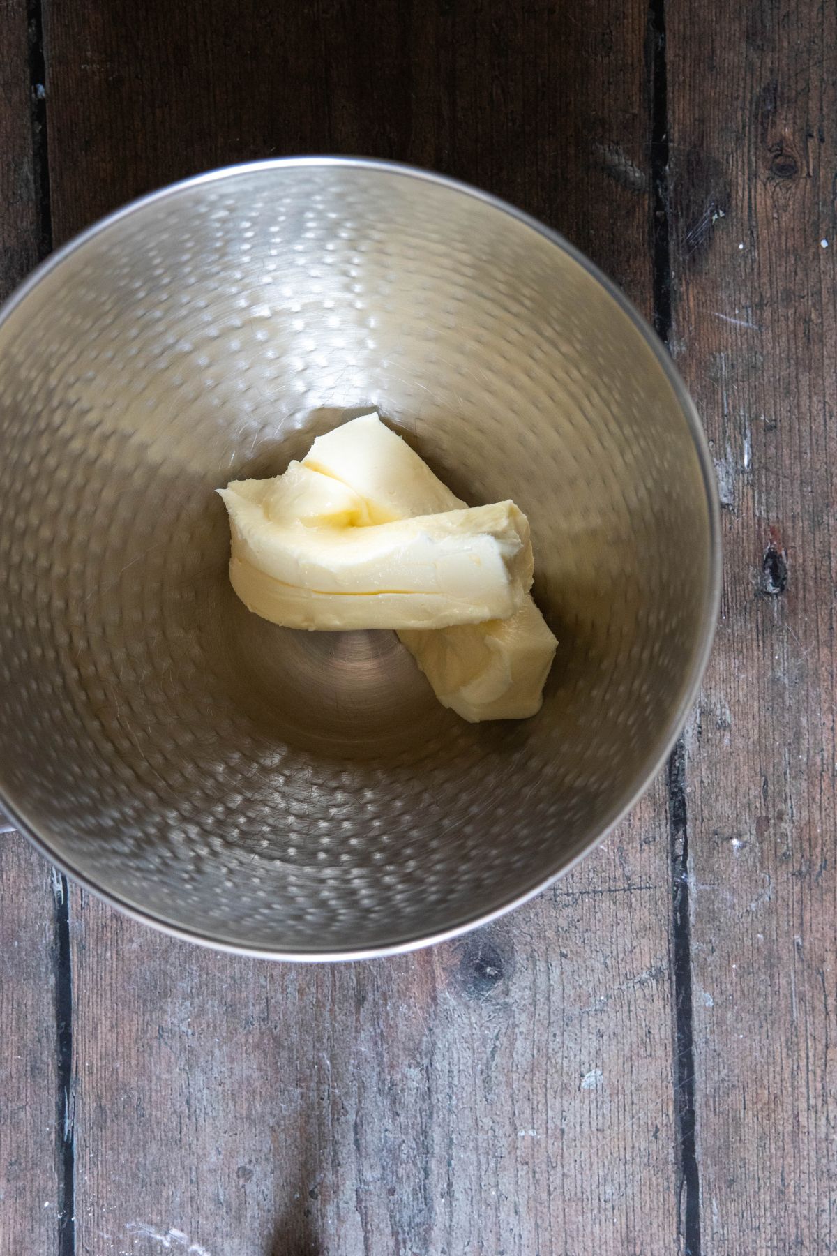 softened butter in a mixing bowl