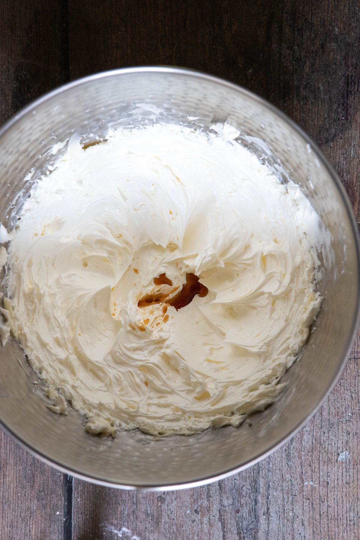 whipped butter with vanilla in a mixing bowl for russian buttercream