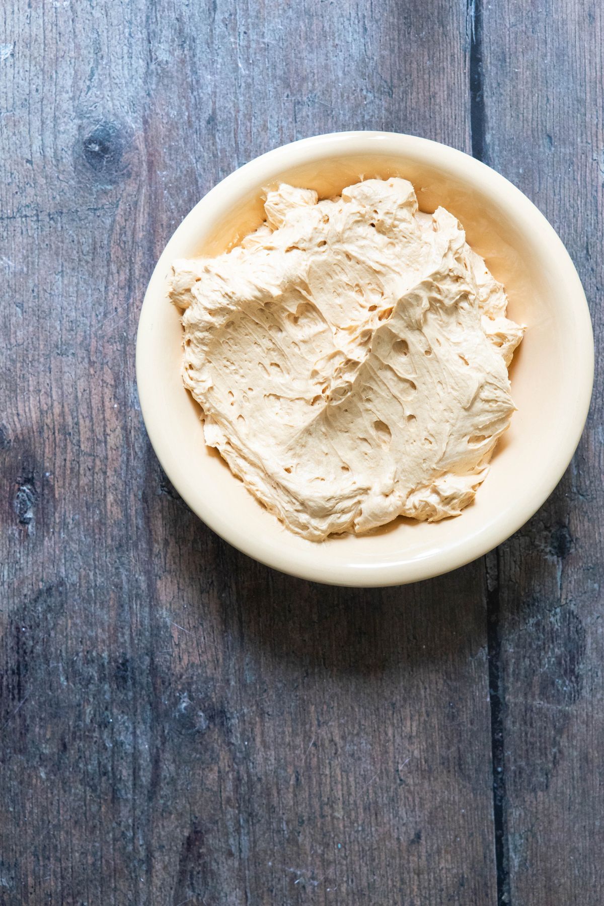 russian buttercream in a yellow bowl