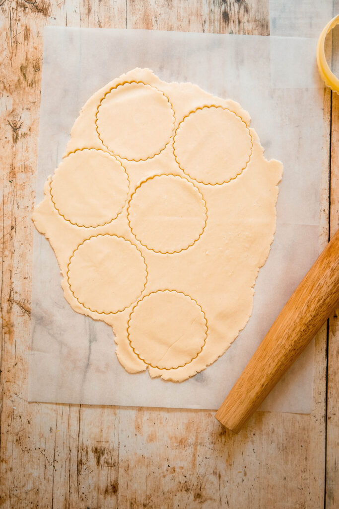 pastry dough rolled out with cuts in it