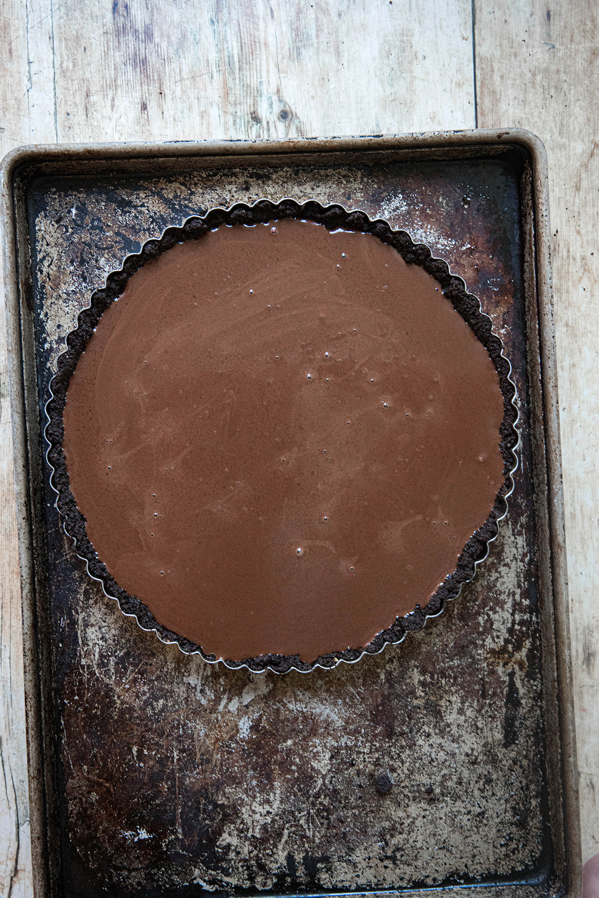 chocolate tart on a baking sheet