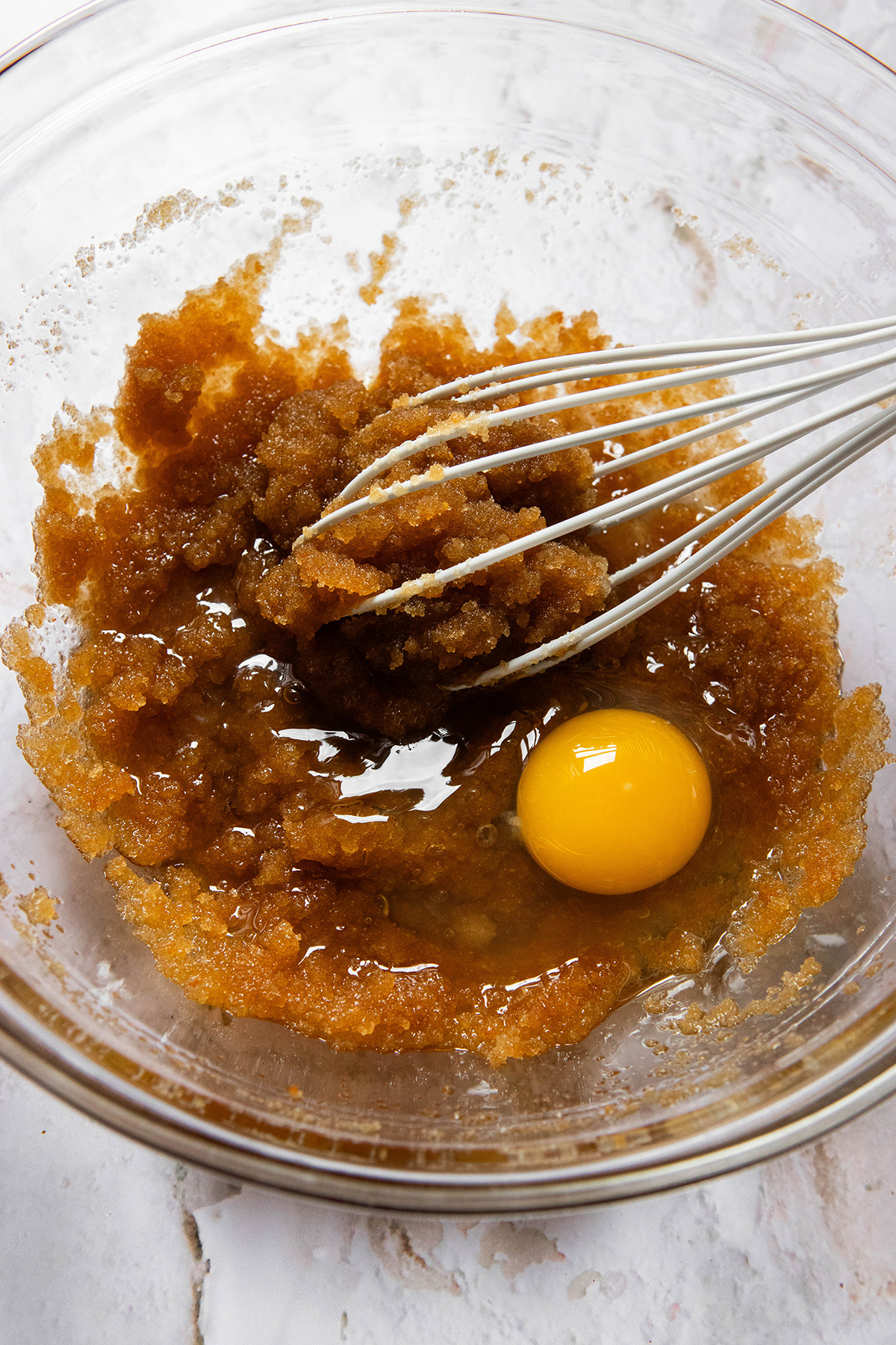 sugar with an egg in a bowl
