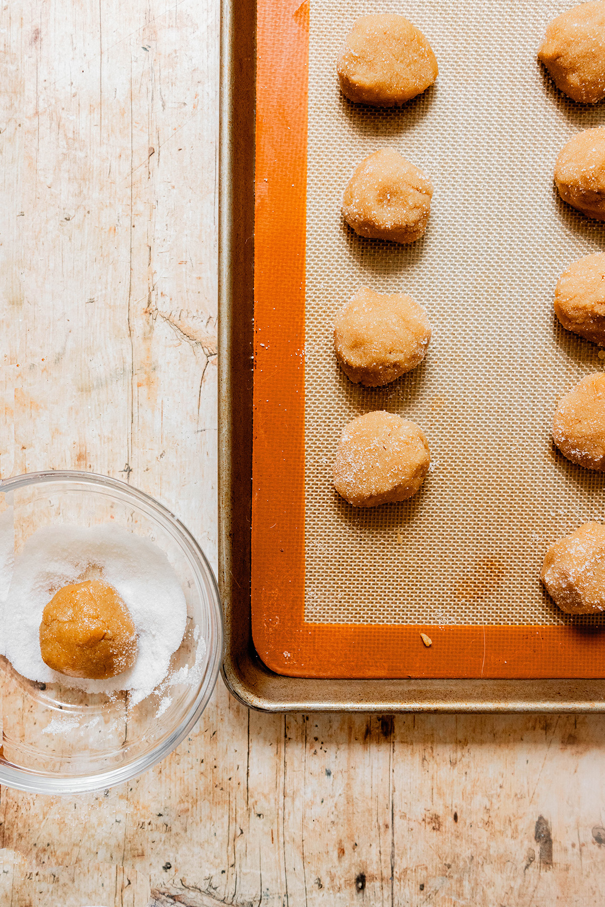 Peanut Butter Miso Cookies dough balls on a baking sheet