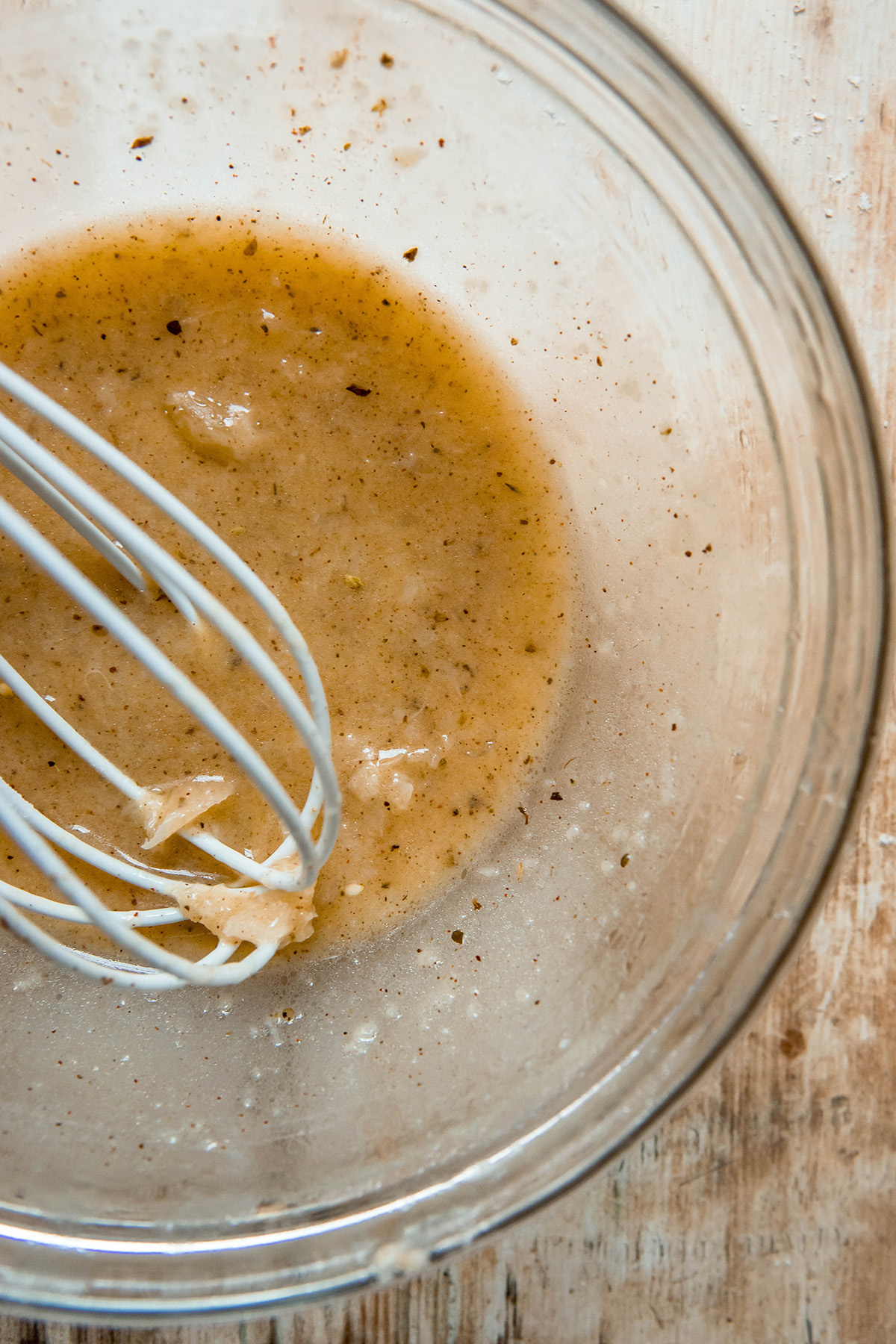 lemon sauce mixture with whisk 